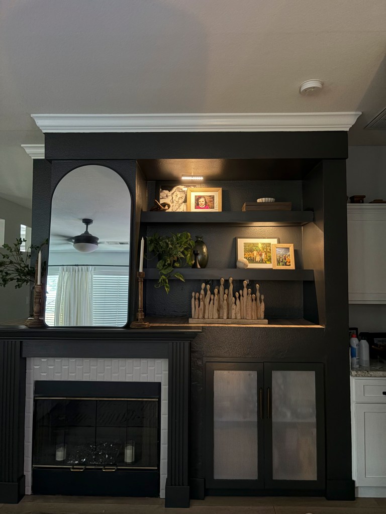 Sherwin-Williams Iron Ore built-in cabinets with aged bronze pulls
